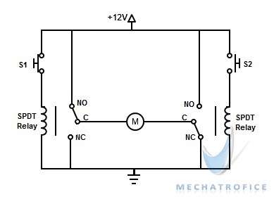 DC motor direction control using relay circuit
